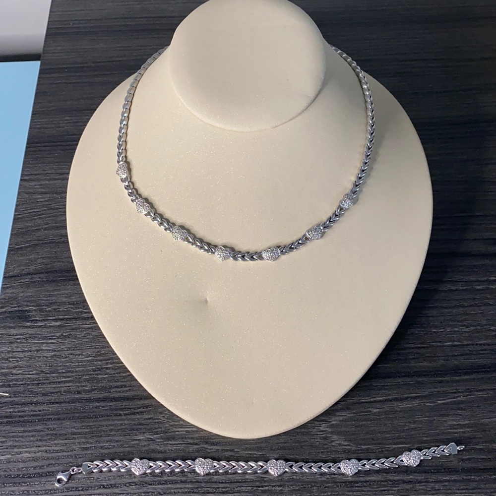 Sterling silver necklace and bracelet set.